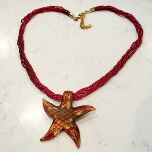 New without tag, Authentic Venetian murano glass red gold starfish necklace